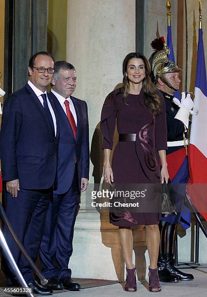 French President Francois Hollande welcomes King Abdallah II of Jordan and Queen Rania Al Abdullah of Jordan prior to a working dinner at Elysee...