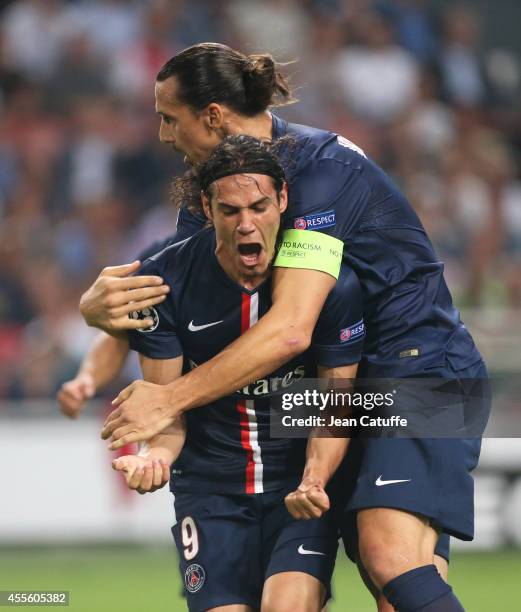 Edinson Cavani of PSG celebrates scoring the 1st goal for his team with Zlatan Ibrahimovic of PSG during the UEFA Champions League Group F match...