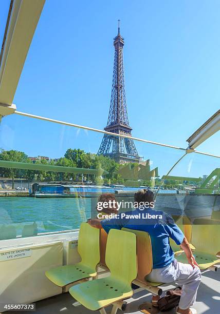 eiffel tower - tourboat stock pictures, royalty-free photos & images