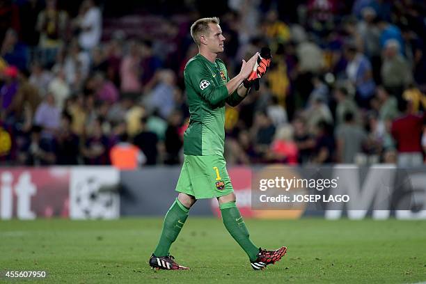 Barcelona's German goalkeeper Marc-Andre ter Stegen celebrates at the end of the UEFA Champions League football match FC Barcelona vs APOEL FC at the...