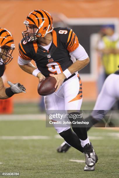 Tyler Wilson of the Cincinnati Bengals drops back to pass during the game against the Indianapolis Colts at Paul Brown Stadium on August 28, 2014 in...