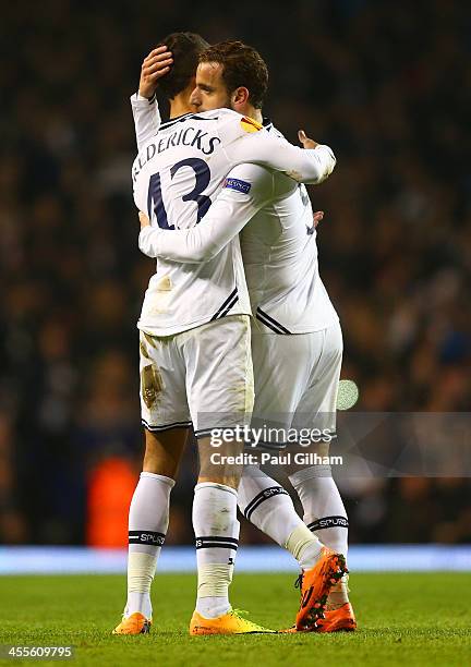 Ryan Fredericks of Tottenham Hotspur congratulates Roberto Soldado of Tottenham Hotspur after he scored his hat trick goal from the penalty spot...
