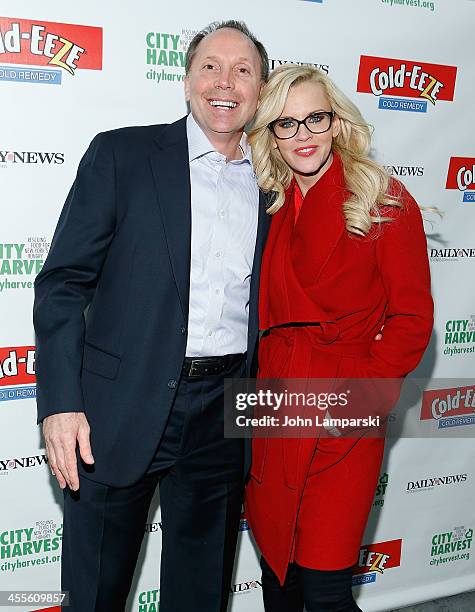 Jenny McCarthy and Ted Karkus CEO of ProPhase attends the The 2013 Daily News Readers Care To Feed the Hungry Canned Food Drive Hosted By City...