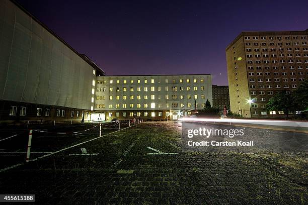 Buildings of the archives of the former East German secret police, known as the Stasi, are illuminated on September 17, 2014 in Berlin, Germany. The...
