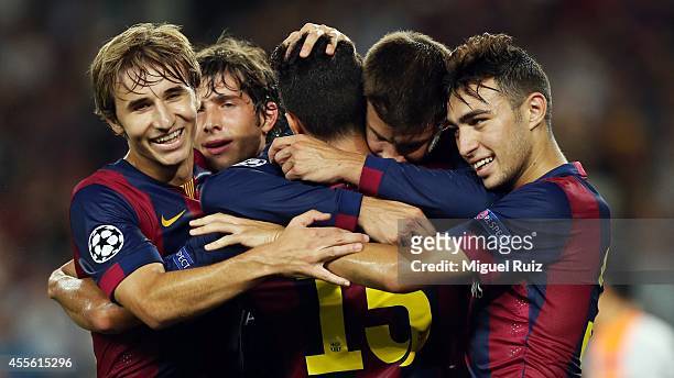 Gerard Pique of FC Barcelona celebrates his goal with his team-mates during the Champions League match between FC Barcelona and Apoel CF at Camp Nou...