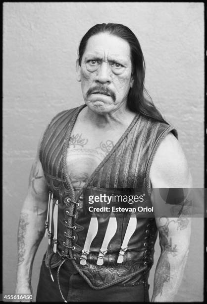 Actor Danny Trejo poses for the Machete movie premiere in an alley behind the Orpheum Theatre Downtown Los Angeles 2010.