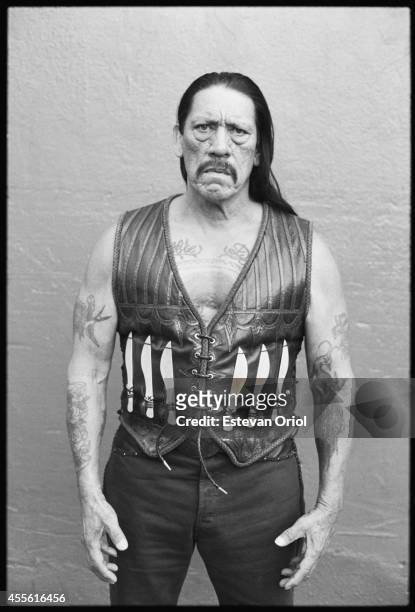 Actor Danny Trejo poses for the Machete movie premiere in an alley behind the Orpheum Theatre Downtown Los Angeles 2010.