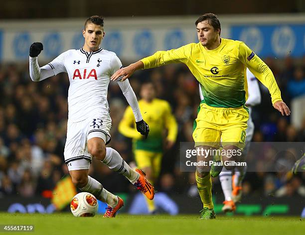 Erik Lamela of Tottenham Hotspur and Alexandru Epureanu of Anzhi Makhachkala during the UEFA Europa League Group K match between Tottenham Hotspur FC...