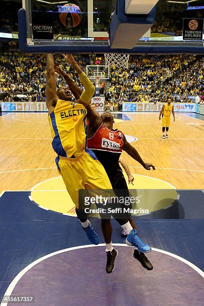Alex Tyus, #9 of Maccabi Electra Tel Aviv competes with Juan Palacios, #9 of Lietuvos Rytas Vilnius in action during the 2013-2014 Turkish Airlines...