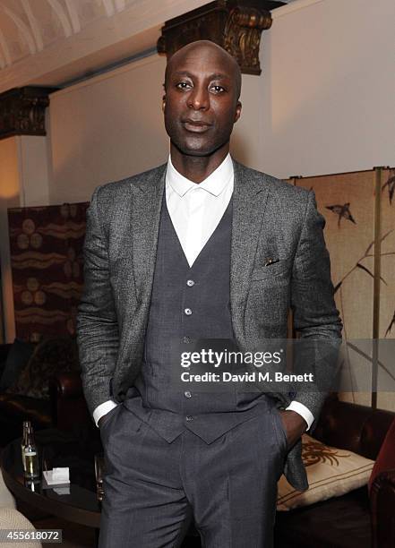 Ozwald Boateng attends the STANDSEVEN party hosted by David Adjaye and Ross Lovegrove at The Club at Cafe Royal on September 17, 2014 in London,...