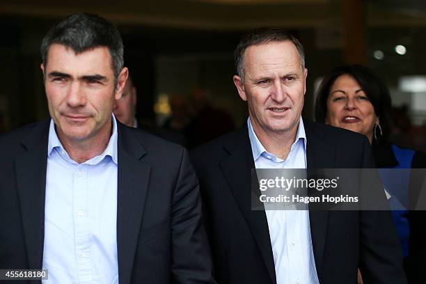 To R, Otaki candidate and Minister of Primary Industries Nathan Guy, Prime Minister John Key and Education Minister Hekia Parata look on during a...