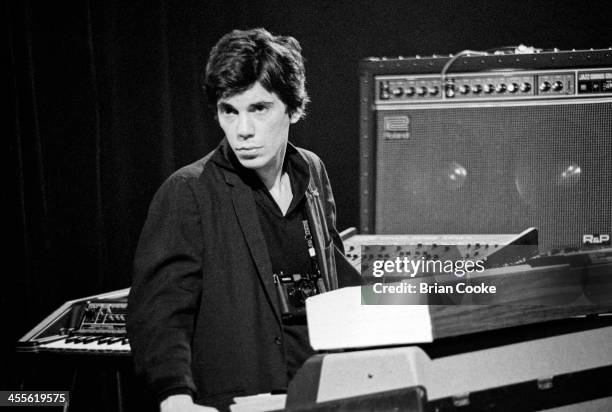 Jimmy Destri of Blondie playing keyboards during the recording of a pop promo for their single 'Picture This' at Isleworth Studios, Isleworth, London...