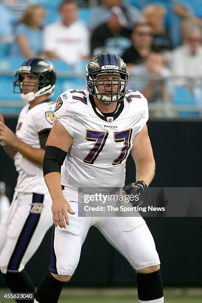 Matt Birk of the Baltimore Ravens participates in warm-ups before a game against the Carolina Panthers on August 29, 2009 at the Bank of America...