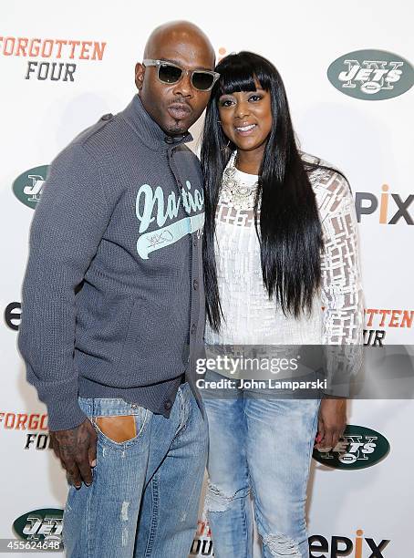 Anthony Criss and Cicely Evans attend "Forgotten Four: The Integration Of Pro Football" at The New York Times Center on September 17, 2014 in New...