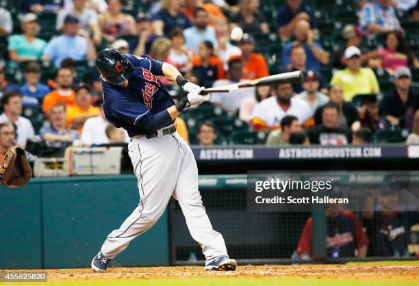 Yan Gomes of the Cleveland swings at a pitch during the eighth inning against of the Houston Astros during their game at Minute Maid Park on...