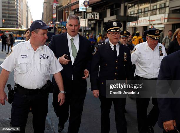 Transit Bureau Chief Joseph Fox and police officers patrol in Times Square, New York on 17 September, 2014. Security measures tightened on critical...