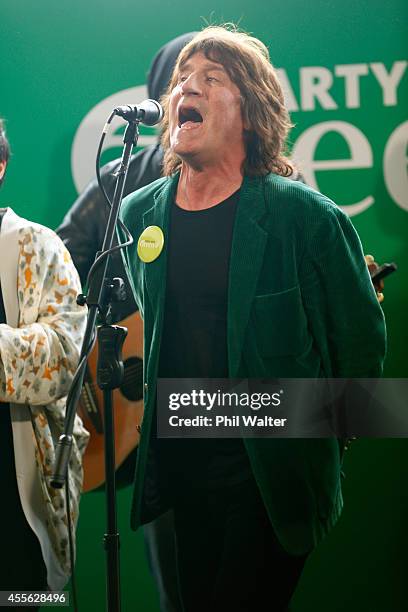 Green Party supporter Jordan Luck sings during the Green Party election campaign event at St Kevins Arcade in Auckland on September 18, 2014 in...