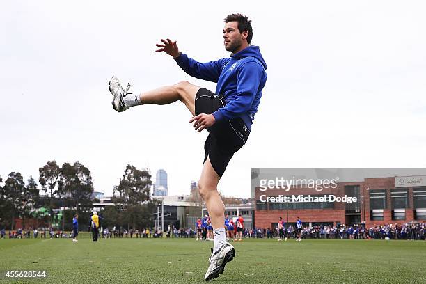 Levi Greenwood kicks the ball during a North Melbourne Kangaroos AFL training session at Arden Street Ground on September 18, 2014 in Melbourne,...