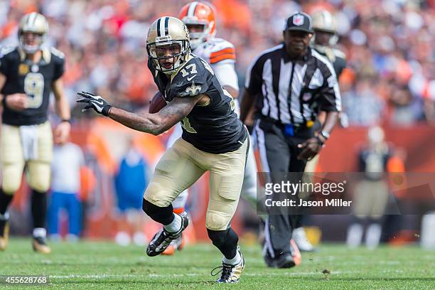 Robert Meachem of the New Orleans Saints carries the ball during the second quarter against the Cleveland Browns at FirstEnergy Stadium on September...