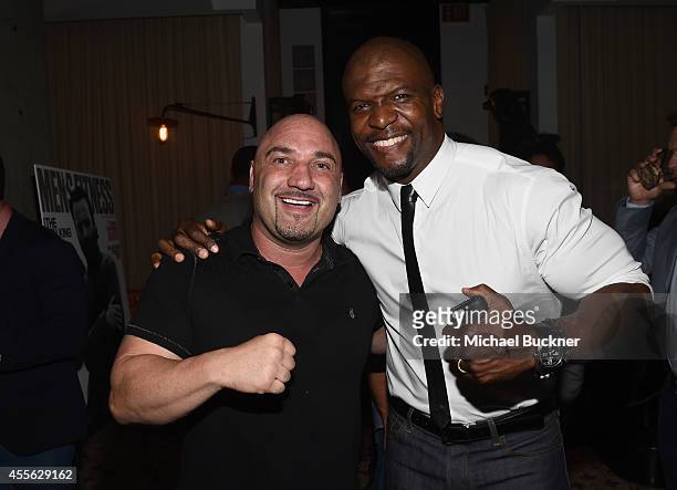Reporter Jay Glazer and Terry Crews at the MEN'S FITNESS 2014 GAME CHANGERS event at Palihouse on September 17, 2014 in West Hollywood, California.