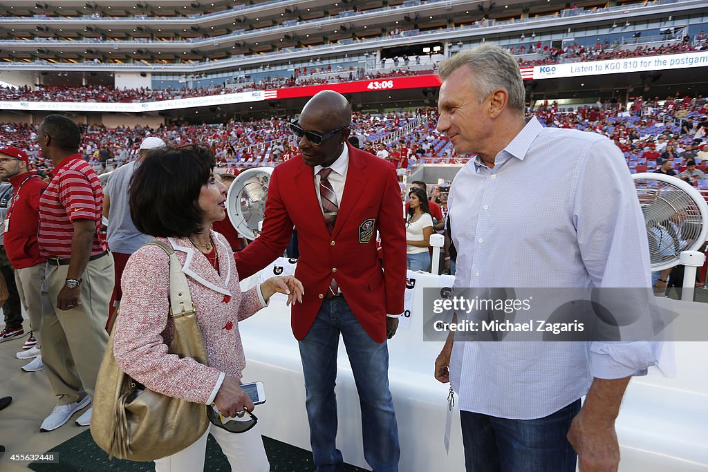 Jerry Rice and Joe Montana talk with Denise DeBartolo York on the