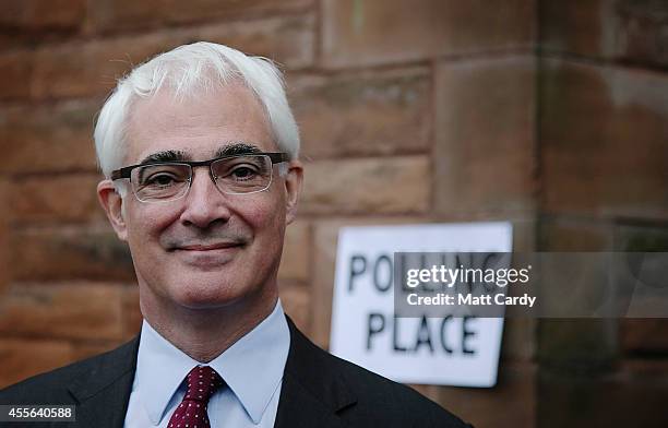 Leader of the Better Together campaign, Alistair Darling arrives to vote at at Church Hill Theatre polling station in Morningside on September 18,...