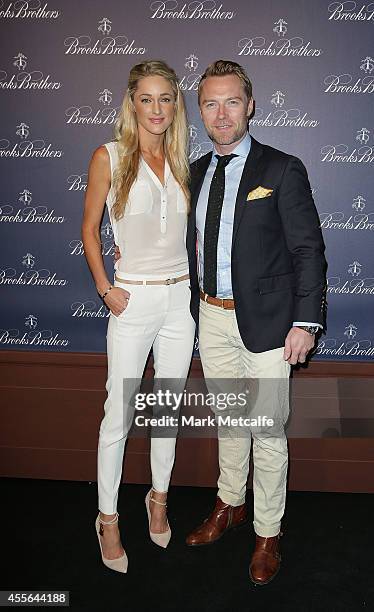 Storm Euchritz and Ronan Keating arrive to celebrate the opening of Brooks Brothers Australian flagship store on September 18, 2014 in Sydney,...