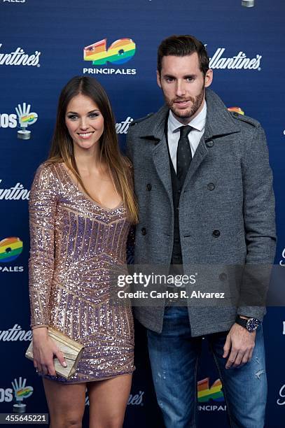 Spanish model Helen Lindes and Rudy Fernandez attend the "40 Principales Awards" 2013 photocall at Palacio de los Deportes on December 12, 2013 in...