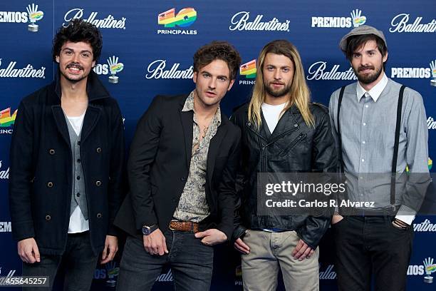 Spanish pop band El Viaje de Eliot attends the "40 Principales Awards" 2013 photocall at Palacio de los Deportes on December 12, 2013 in Madrid,...