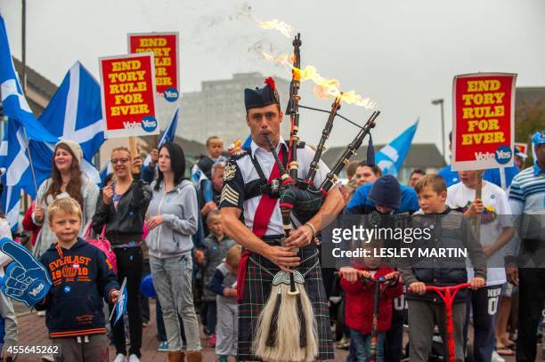 Piper Ryan Randall leads a pro-Scottish independence rally in the suburbs of Edinburgh on September 18 during Scotland's independence referendum....