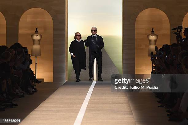 Karl Lagerfeld and Silvia Venturini Fendi acknowledge the applause of the audience after the Fend show as a part of Milan Fashion Week Womenswear...