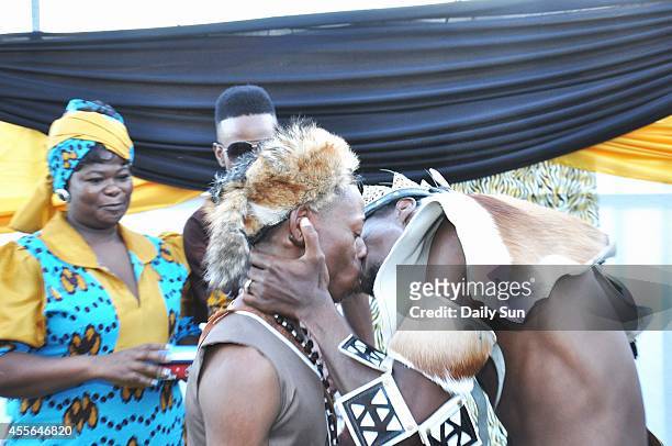 Tshepo Modisane and Thobajobe Sithole share a kiss on April 6, 2013 at Siva Sungum Hall in Kwadukuza, South Africa. Modisane and Sithole made history...