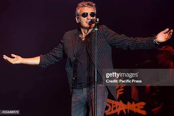 Luciano Ligabue or simply "Ligabue", an Italian singer-songwriter and film director performs live concert at the Olympic Stadium in Turin for...