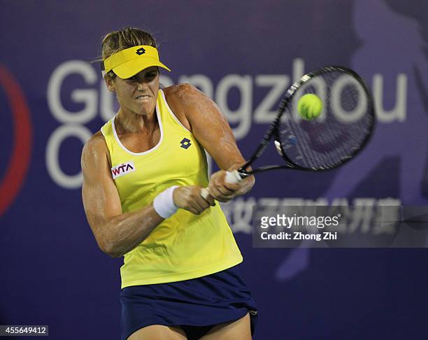 Maria-Teresa Torro-Flor of Spain returns a shot during her match against Timea Bacsinszky of Switzerland during day four of the 2014 WTA Guangzhou...
