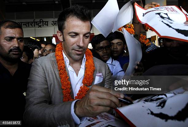 Italian footballer Alessandro Del Piero signs autographs for fans at IGI Airport on September 18, 2014 in New Delhi, India. 2006 Italian World Cup...