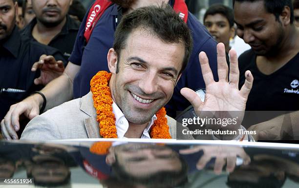 Italian footballer Alessandro Del Piero being welcomed by fans on his arrival at IGI on September 18, 2014 in New Delhi, India. 2006 Italian World...