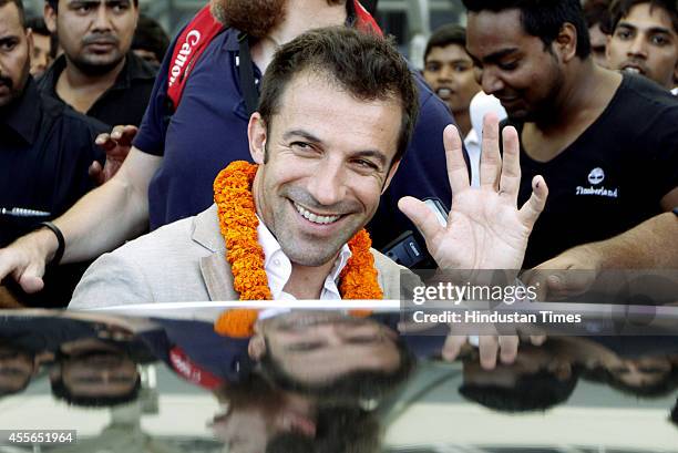 Italian footballer Alessandro Del Piero being welcomed by fans on his arrival at IGI on September 18, 2014 in New Delhi, India. 2006 Italian World...