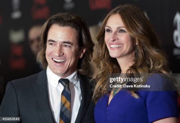 Dermot Mulroney and Julia Roberts attends the "August: Osage County" premiere at Ziegfeld Theater on December 12, 2013 in New York City.