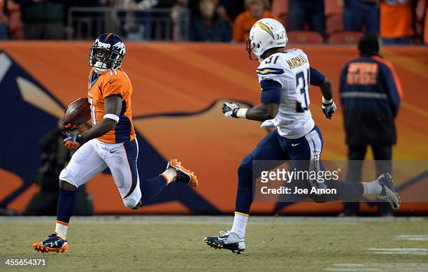 Denver Broncos wide receiver Trindon Holliday runs back the kick off to start the gam. The Denver Broncos vs. The San Diego Chargers at Sports...
