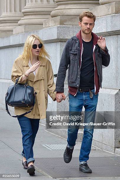 Dakota Fanning and boyfriend Jamie Strachan out in downtown Manhattan. On September 16, 2013 in New York City.