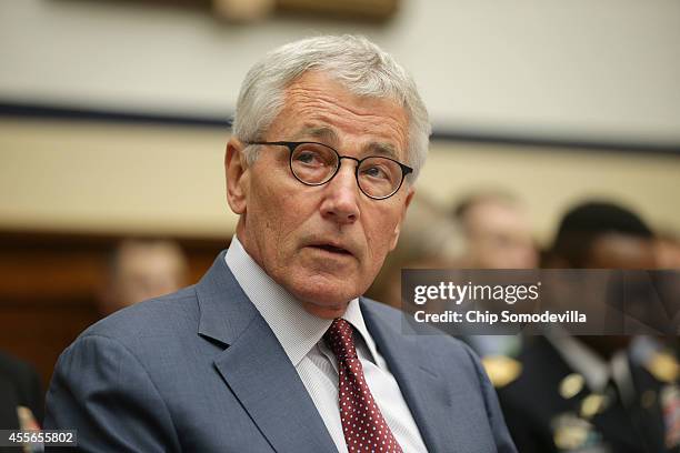 Defense Secretary Chuck Hagel testifies before the House Armed Services Committee about the ongoing threat from the Islamic State of Iraq and the...