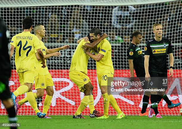 Ikechukwu Uche of Villareal CF celebrates after scoring the first goal during the UEFA Europa League Group A match between Borussia Moenchengladbach...