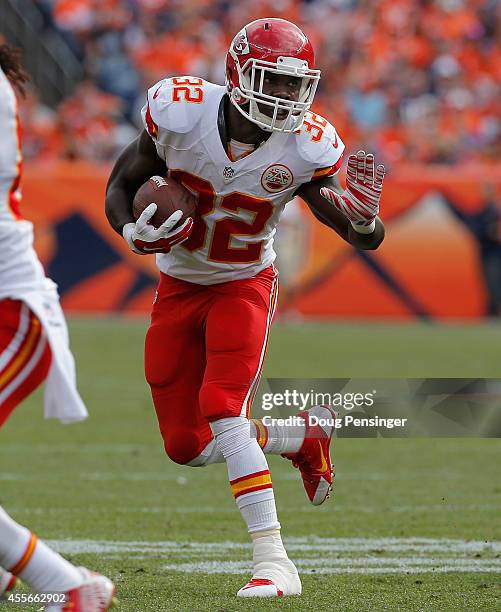 Running back Cyrus Gray of the Kansas City Chiefs carries the ball against the Denver Broncos at Sports Authority Field at Mile High on September 14,...