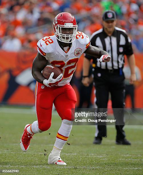 Running back Cyrus Gray of the Kansas City Chiefs carries the ball against the Denver Broncos at Sports Authority Field at Mile High on September 14,...