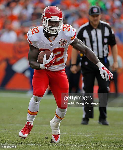 Running back Cyrus Gray of the Kansas City Chiefs carries the ball against the Denver Broncos at Sports Authority Field at Mile High on September 14,...