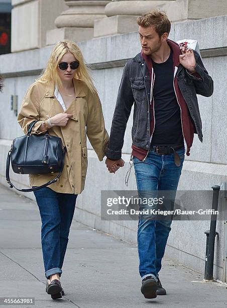 Dakota Fanning and boyfriend Jamie Strachan out in downtown Manhattan. On September 16, 2013 in New York City.