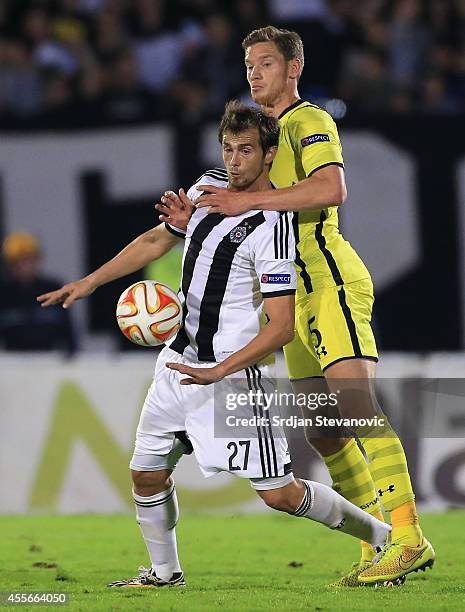 Jan Vertonghen of Tottenham Hotspur try to stop Danko Lazovic of Partizan during the UEFA Europa League match between Partizan and Tottenham Hotspur...