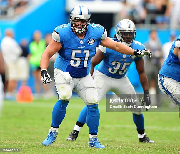 Dominic Raiola of the Detroit Lions blocks against the Carolina Panthers at Bank of America Stadium on September 14, 2014 in Charlotte, North...