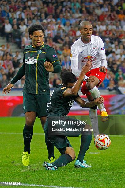 Virgil van Dijk of Celtic, Jason Denayer of Celtic and Andreas Ulmer of Salzburg compete for the ball during the UEFA Europa League match between...