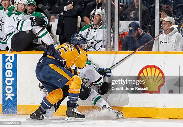 Shea Weber of the Nashville Predators is called for boarding against Dustin Jeffrey of the Dallas Stars at Bridgestone Arena on December 12, 2013 in...